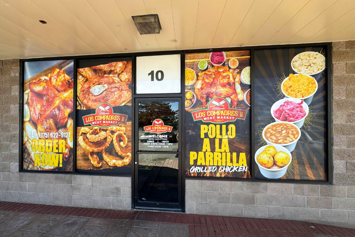 Outside window display by Rosales Strategies for Los Compadres Chicken
